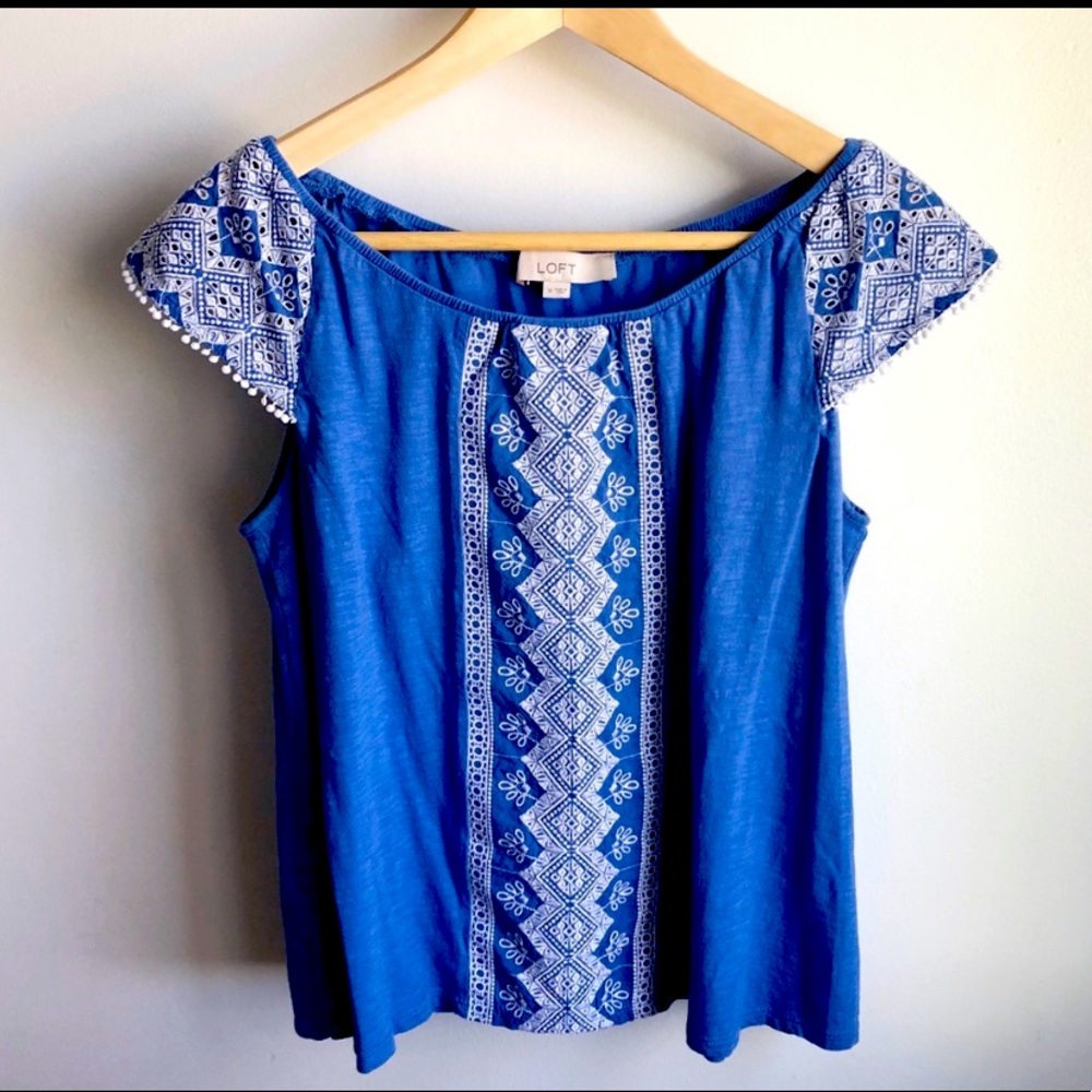 Loft embroidered top, blue with white stitching.
